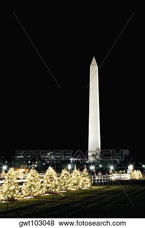 Tower lit up at night, Washington Monument, Washington DC, USA View Large Photo Image Stock Photo - Tower lit up at night, Washington Monument, Washington DC, USA. Fotosearch
