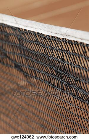 Stock Image - Close-up of a tennis net. Fotosearch
