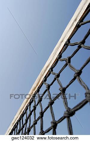 Stock Image - Low angle view of a tennis net. Fotosearch