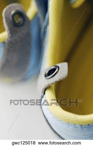 Stock Photo - Close-up of a pair of sports shoes. Fotosearch