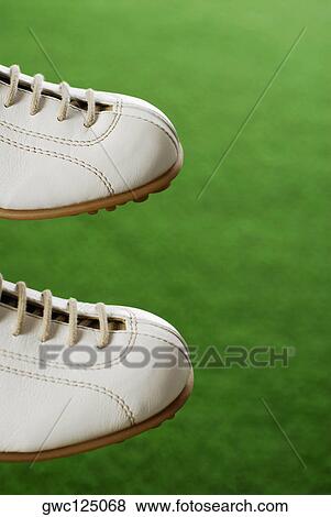 Stock Photo - Close-up of a pair of sports shoes. Fotosearch