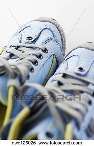 Stock Photograph - Close-up of a pair of sports shoes. Fotosearch