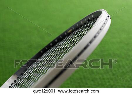 Stock Image - Close-up of a tennis racket. Fotosearch