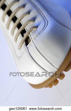 Close-up of a tennis shoe View Large Photo Image Stock Image - Close-up of a tennis shoe. Fotosearch