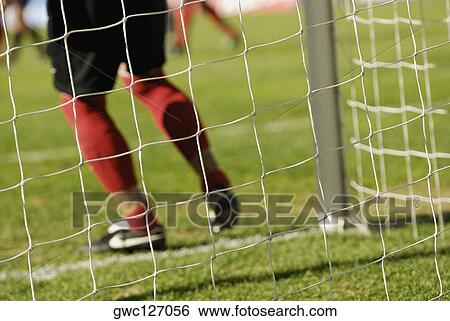 Stock Photograph - Close-up of a pair of sports shoes. Fotosearch