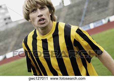 Close-up of a soccer player in anger View Large Photo Image Stock Image - Close-up of a soccer player in anger. Fotosearch