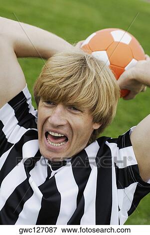 Close Up Of A Soccer Player Throwing A Soccer Ball Stock Photo Gwc Fotosearch