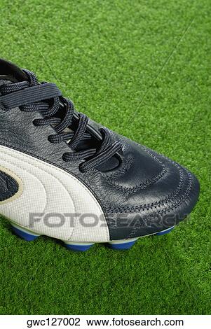 Close-up of a soccer shoe View Large Photo Image Stock Image - Close-up of a soccer shoe. Fotosearch