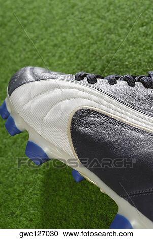 Stock Image - Close-up of a soccer shoe. Fotosearch