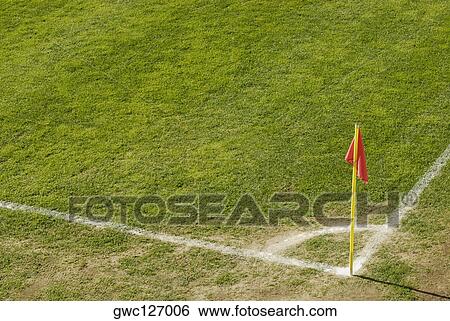 Stock Photograph - High angle view of a flag on a soccer field. Fotosearch