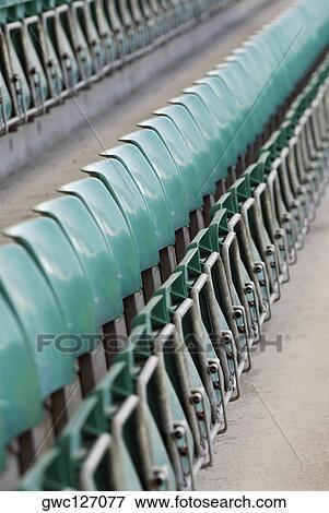 High angle view of seats in a stadium View Large Photo Image Stock Photo - High angle view of seats in a stadium. Fotosearch