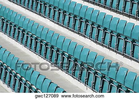 High angle view of seats in a stadium View Large Photo Image Stock Photo - High angle view of seats in a stadium. Fotosearch