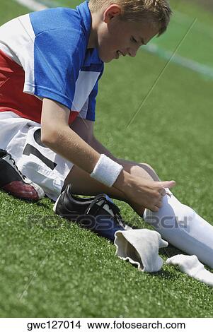 Side profile of a boy wearing socks View Large Photo Image Picture - Side profile of a boy wearing socks. Fotosearch