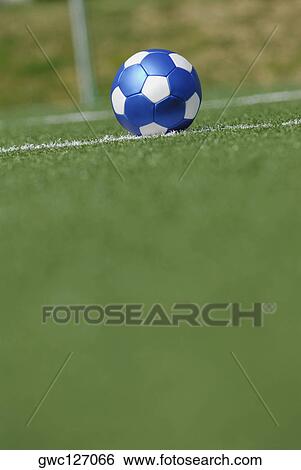 Soccer ball in a soccer field View Large Photo Image Stock Photograph - Soccer ball in a soccer field. Fotosearch