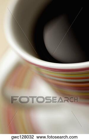 Close-up of a cup of a black tea View Large Photo Image Stock Image - Close-up of a cup of a black tea. Fotosearch