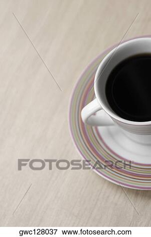 Close-up of a cup of a black tea View Large Photo Image Stock Photo - Close-up of a cup of a black tea. Fotosearch
