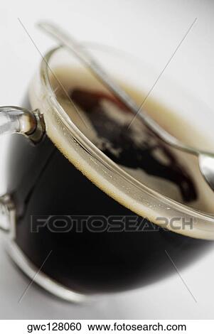 Close-up of a cup of black coffee View Large Photo Image Stock Image - Close-up of a cup of black coffee. Fotosearch