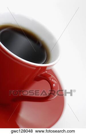 Close-up of a cup of black tea on a saucer View Large Photo Image Stock Photo - Close-up of a cup of black tea on a saucer. Fotosearch