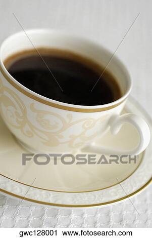 Close-up of a cup of black tea View Large Photo Image Stock Image - Close-up of a cup of black tea. Fotosearch