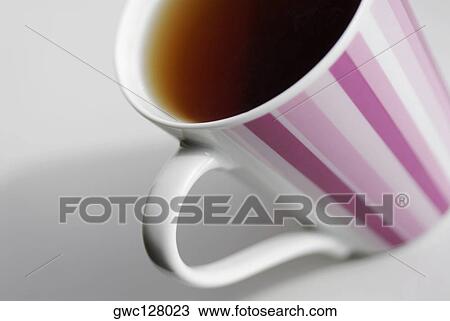 Close-up of a cup of black tea View Large Photo Image Stock Image - Close-up of a cup of black tea. Fotosearch