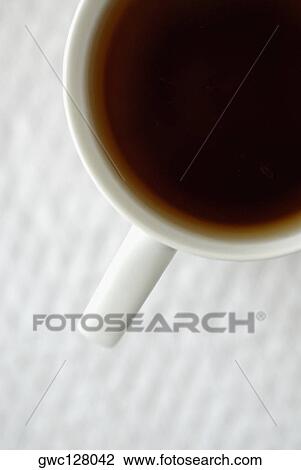 Close-up of a cup of black tea View Large Photo Image Stock Image - Close-up of a cup of black tea. Fotosearch