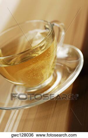 Close-up of a cup of herbal tea View Large Photo Image Stock Photograph - Close-up of a cup of herbal tea. Fotosearch