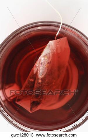 Close-up of a teabag in a tea cup View Large Photo Image Stock Image - Close-up of a teabag in a tea cup. Fotosearch