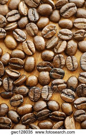 Close-up of coffee beans View Large Photo Image Stock Photography - Close-up of coffee beans. Fotosearch