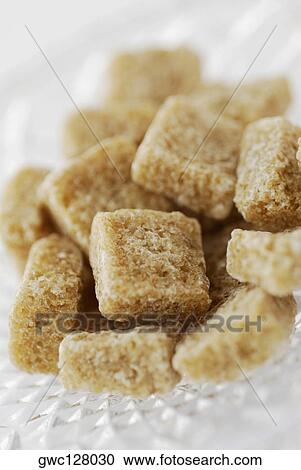 Close-up of cubes of brown sugar View Large Photo Image Stock Image - Close-up of cubes of brown sugar. Fotosearch
