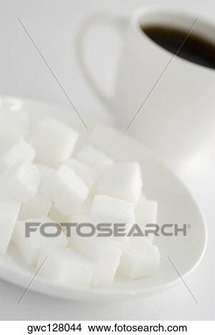 Close-up of sugar cubes in a plate View Large Photo Image Picture - Close-up of sugar cubes in a plate. Fotosearch