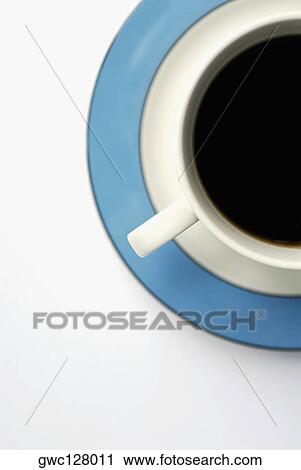 High angle view of a cup of black tea View Large Photo Image Stock Image - High angle view of a cup of black tea. Fotosearch