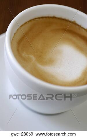 High angle view of a cup of coffee View Large Photo Image Stock Photo - High angle view of a cup of coffee. Fotosearch