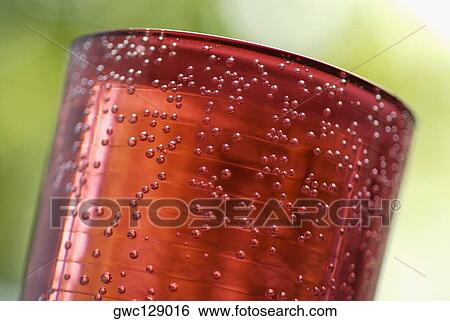 Close-up of a glass full of soda View Large Photo Image Stock Photograph - Close-up of a glass full of soda. Fotosearch