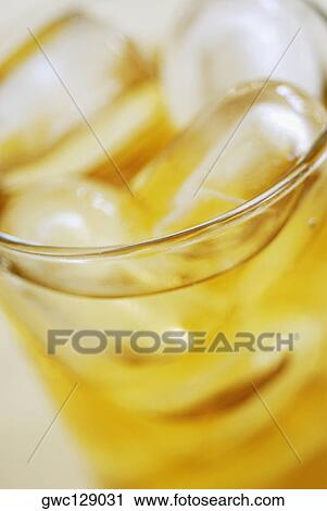 Close-up of a glass of whiskey View Large Photo Image Stock Image - Close-up of a glass of whiskey. Fotosearch