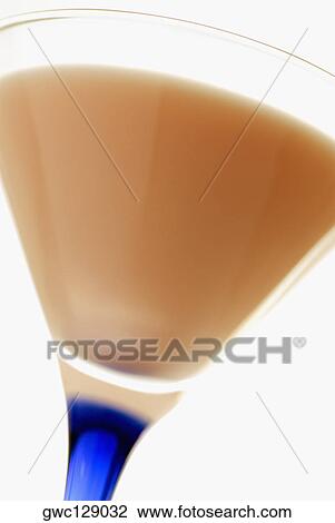 Close-up of milk in a martini glass View Large Photo Image Stock Image - Close-up of milk in a martini glass. Fotosearch