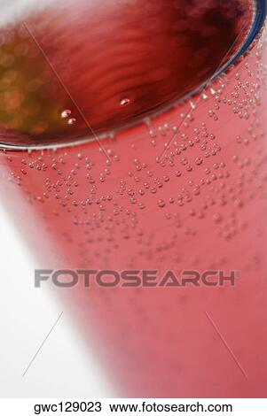 Close-up of soda in a glass View Large Photo Image Stock Image - Close-up of soda in a glass. Fotosearch
