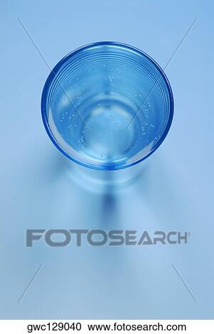High angle view of a glass of water View Large Photo Image Stock Image - High angle view of a glass of water. Fotosearch