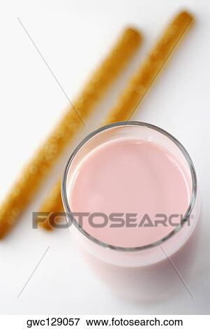 High angle view of a milkshake with two breadsticks View Large Photo Image Stock Photo - High angle view of a milkshake with two breadsticks. Fotosearch