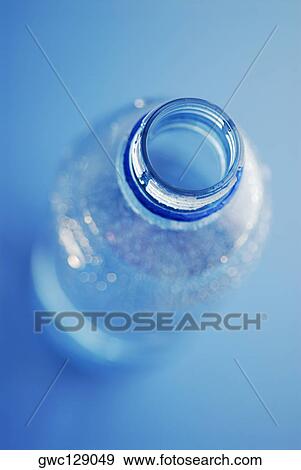 High angle view of an open water bottle View Large Photo Image Stock Photo - High angle view of an open water bottle. Fotosearch
