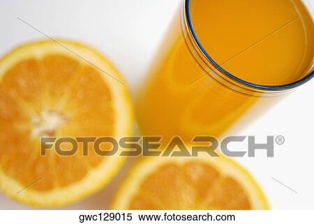 High angle view of orange juice with orange slices View Large Photo Image Stock Photography - High angle view of orange juice with orange slices. Fotosearch