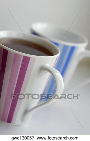 Close-up of two cups of black tea View Large Photo Image Stock Photo - Close-up of two cups of black tea. Fotosearch