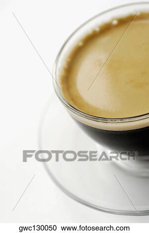 High angle view of a cup of black coffee View Large Photo Image Stock Image - High angle view of a cup of black coffee. Fotosearch