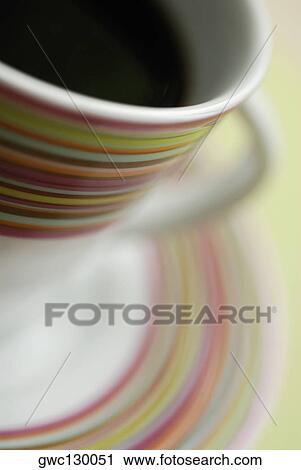 High angle view of a cup of black tea on a saucer View Large Photo Image Stock Image - High angle view of a cup of black tea on a saucer. Fotosearch