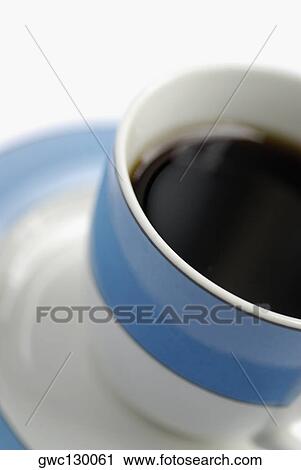 High angle view of a cup of black tea View Large Photo Image Stock Image - High angle view of a cup of black tea. Fotosearch