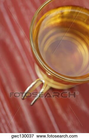 High angle view of a cup of herbal tea View Large Photo Image Stock Photo - High angle view of a cup of herbal tea. Fotosearch