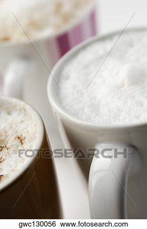 High angle view of cups of coffee View Large Photo Image Stock Photograph - High angle view of cups of coffee. Fotosearch