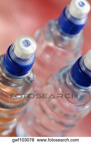 Stock Photo - Close-up of three water bottles. Fotosearch