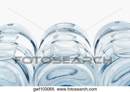 Close-up of three water bottles View Large Photo Image Stock Photography - Close-up of three water bottles. Fotosearch