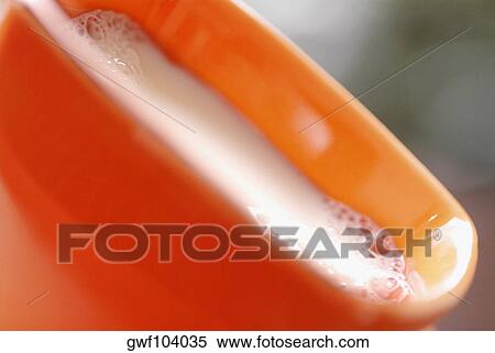 Close-up of a cup of milk View Large Photo Image Stock Photography - Close-up of a cup of milk. Fotosearch