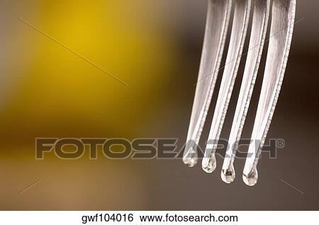 Stock Photograph - Close-up of a wet fork. Fotosearch